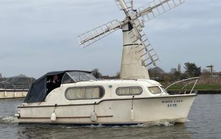 White Lady passing Thurne Windmill early March 2023