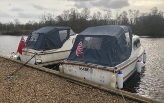 Looking pre-season scruffy but living the dream - White Lady and Wey Rambler tied up at Womack Staithe early March 2023
