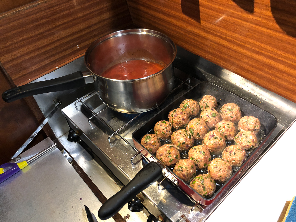 Preparing our last meal of our holiday - Special meatballs in tomato sauce and pasta