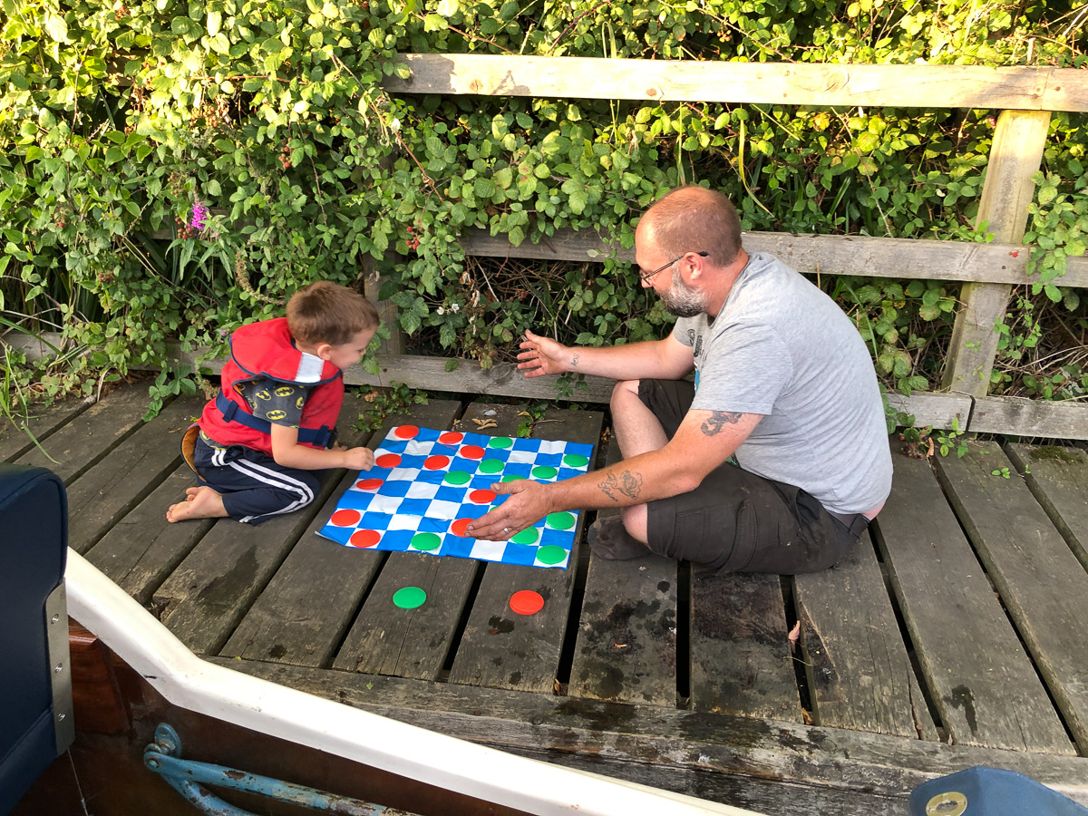 Martin with son playing precarious board games